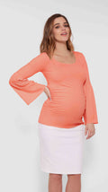 Stowaway Collection Bell Sleeve Maternity Top in Coral Front View
