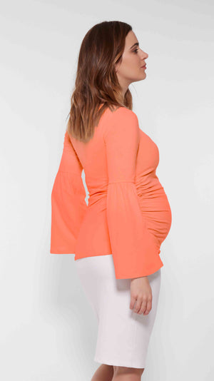 Stowaway Collection Bell Sleeve Maternity Top in Coral Back View